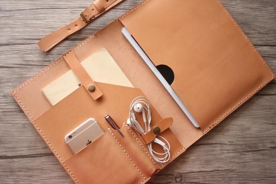 Leather MacBook Pro Case with front pockets suitable for phones, notebooks, pass...