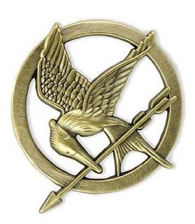 The Mockingjay Pin - The Hunger Games from a page of great Hunger Games gift ide...