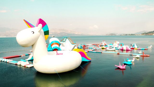 The new Unicornzilla float serves as the centerpiece of Inflatable Island in the...