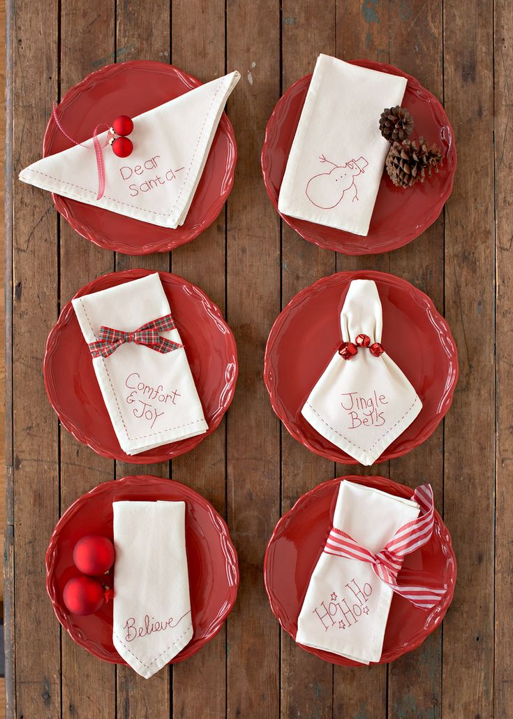 Embellish white napkins with a simple stitched design to create these DIY Christ...