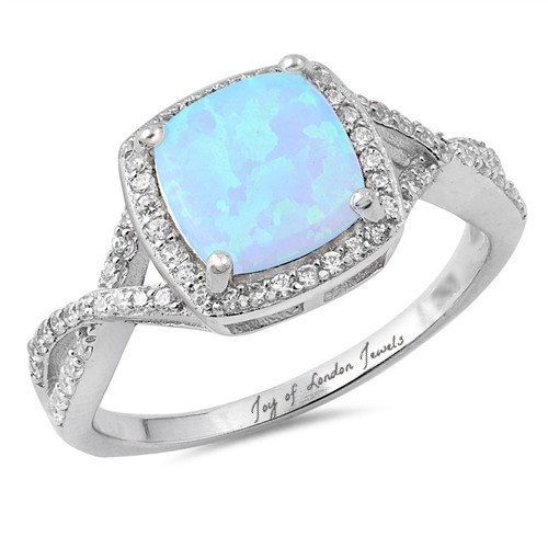 A Perfect Cabochon Australian Blue Opal Engagement Ring